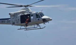 Helicóptero accionado para resgate de turista